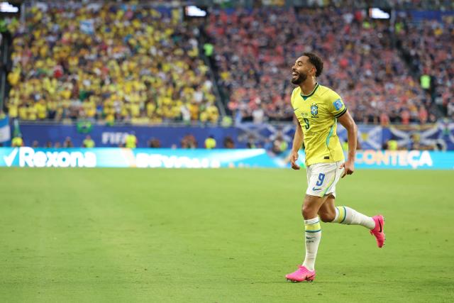 Brazil's forward #09 Matheus Cunha celebrates after scoring his team's third goal during the 2026 World Cup Group C football match between Scotland and Brazil at the Miami Stadium in Miami Gardens on June 24, 2026.  (Photo by PATRICIA DE MELO MOREIRA / AFP)