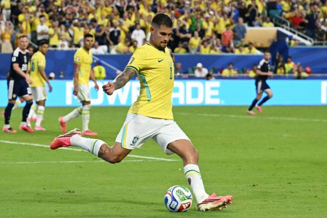Brazil's midfielder #08 Bruno Guimaraes kicks the ball during the 2026 World Cup Group C football match between Scotland and Brazil at the Miami Stadium in Miami Gardens on June 24, 2026.  (Photo by CHANDAN KHANNA / AFP)