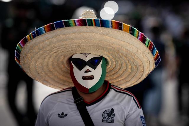 A Mexico fan arrives at the Mexico City Stadium in Mexico City on June 24, 2026 before the 2026 World Cup Group A football match between the Czech Republic and Mexico.  (Photo by CARL DE SOUZA / AFP)