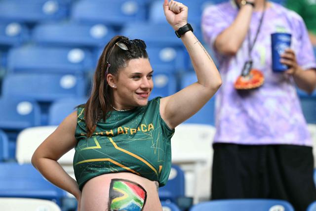 A South African fan cheers while waiting for the start of the 2026 World Cup Group A football match between South Africa and South Korea at the Monterrey Stadium in Guadalupe, Mexico, on June 24, 2026.  (Photo by Yuri CORTEZ / AFP)