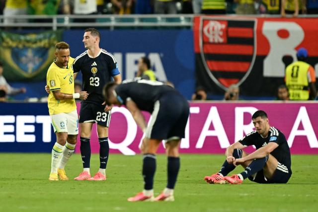 Brazil's forward #10 Neymar greets Scotland's midfielder #23 Kenny McLean at the end of the 2026 World Cup Group C football match between Scotland and Brazil at the Miami Stadium in Miami Gardens on June 24, 2026.  (Photo by CHANDAN KHANNA / AFP)