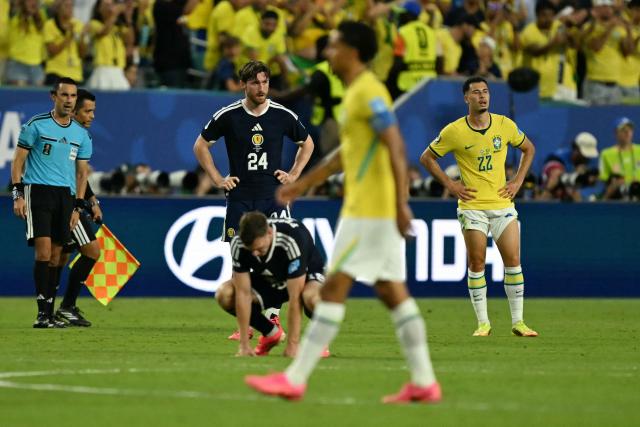 Scotland's defender #24 Anthony Ralston reacts after losing the 2026 World Cup Group C football match between Scotland and Brazil at the Miami Stadium in Miami Gardens on June 24, 2026.  (Photo by CHANDAN KHANNA / AFP)