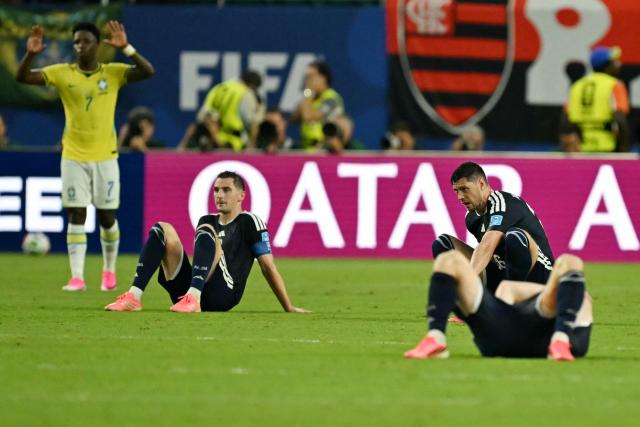 Scotland's defender #06 Kieran Tierney reacts at the end of the 2026 World Cup Group C football match between Scotland and Brazil at the Miami Stadium in Miami Gardens on June 24, 2026.  (Photo by CHANDAN KHANNA / AFP)