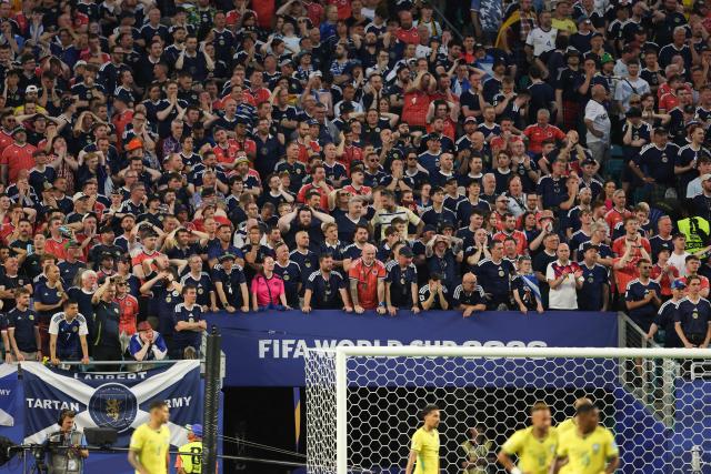 Scottish fans react during the 2026 World Cup Group C football match between Scotland and Brazil at the Miami Stadium in Miami Gardens on June 24, 2026.  (Photo by PATRICIA DE MELO MOREIRA / AFP)