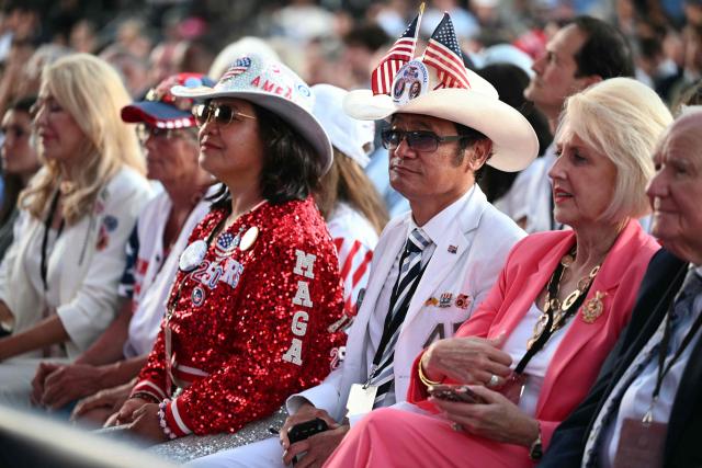 Guests attend a kick-off celebration for the "Great American State Fair" on the National Mall in Washington, DC, June 24, 2026. The "Great American State Fair" will be held from June 25 to July 10, 2026, to celebrate the 250th anniversary of US independence. (Photo by Mandel NGAN / AFP)