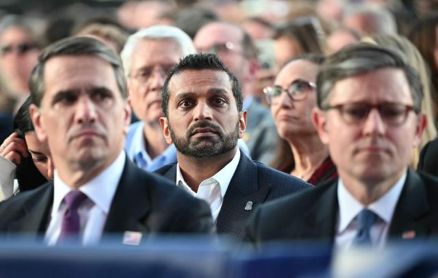 Acting US Attorney General Todd Blanche (L), FBI Director Kash Patel (C) and US Speaker of the House Mike Johnson (R) listen to a speaker during a kick-off celebration for the "Great American State Fair" on the National Mall in Washington, DC, June 24, 2026. The "Great American State Fair" will be held from June 25 to July 10, 2026, to celebrate the 250th anniversary of US independence. (Photo by Mandel NGAN / AFP)