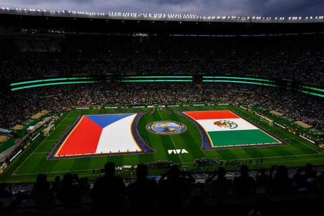 Czech and Mexican flags are displayed on the pitch ahead of the 2026 World Cup Group A football match between the Czech Republic and Mexico at the Mexico City Stadium in Mexico City on June 24, 2026.  (Photo by Rodrigo Oropeza / AFP)