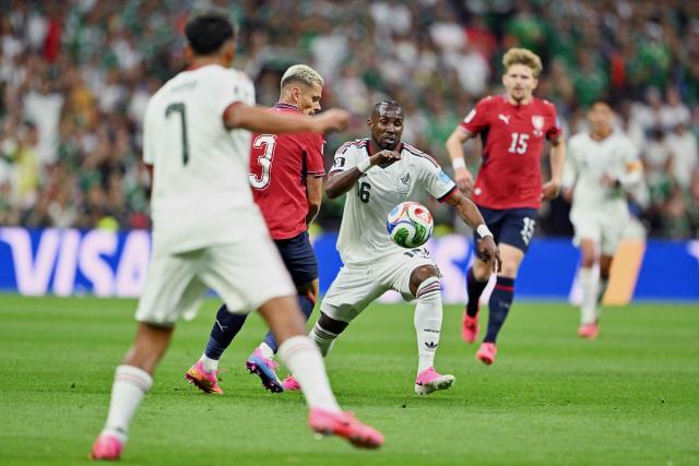 Mexico's forward #16 Julian Quinones and Czech Republic's defender #03 Tomas Holes fight for the ball during the 2026 World Cup Group A football match between the Czech Republic and Mexico at the Mexico City Stadium in Mexico City on June 24, 2026.  (Photo by Carl DE SOUZA / AFP)
