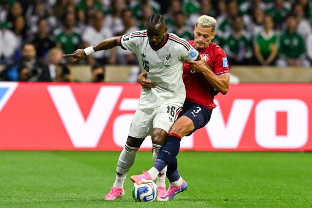 Mexico's forward #16 Julian Quinones and Czech Republic's defender #03 Tomas Holes fight for the ball during the 2026 World Cup Group A football match between the Czech Republic and Mexico at the Mexico City Stadium in Mexico City on June 24, 2026.  (Photo by Alfredo ESTRELLA / AFP)