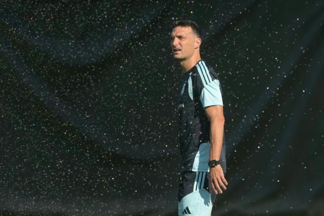 Argentina's head coach Lionel Scaloni gestures under a water sprinkled in a training session during the 2026 World Cup football tournament at Sporting KC Training Centre in Kansas City on June 24, 2026. (Photo by JUAN MABROMATA / AFP)