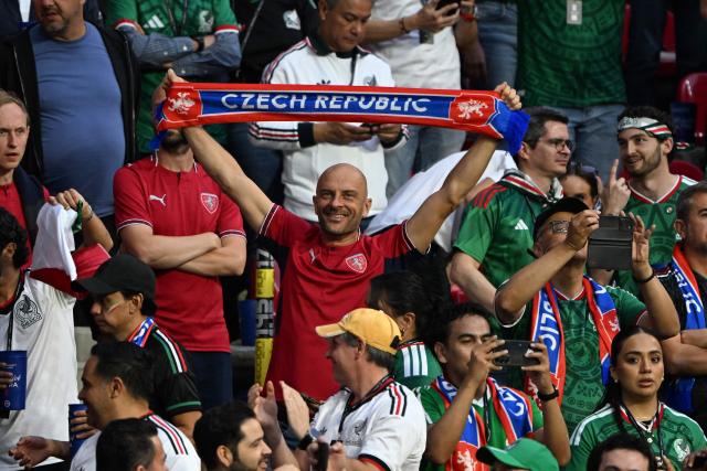A Czech fan shows a scarf cheering for his team during the 2026 World Cup Group A football match between the Czech Republic and Mexico at the Mexico City Stadium in Mexico City on June 24, 2026.  (Photo by Carl DE SOUZA / AFP)
