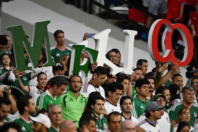Mexican fans show letters that reads "Mexico" cheering for their team during the 2026 World Cup Group A football match between the Czech Republic and Mexico at the Mexico City Stadium in Mexico City on June 24, 2026.  (Photo by Carl DE SOUZA / AFP)