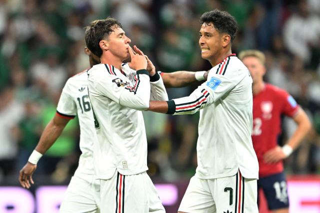 Mexico's defender #20 Mateo Chavez celebrates scoring his team's first goal with teammate midfielder #07 Luis Romo during the 2026 World Cup Group A football match between the Czech Republic and Mexico at the Mexico City Stadium in Mexico City on June 24, 2026.  (Photo by CARL DE SOUZA / AFP)