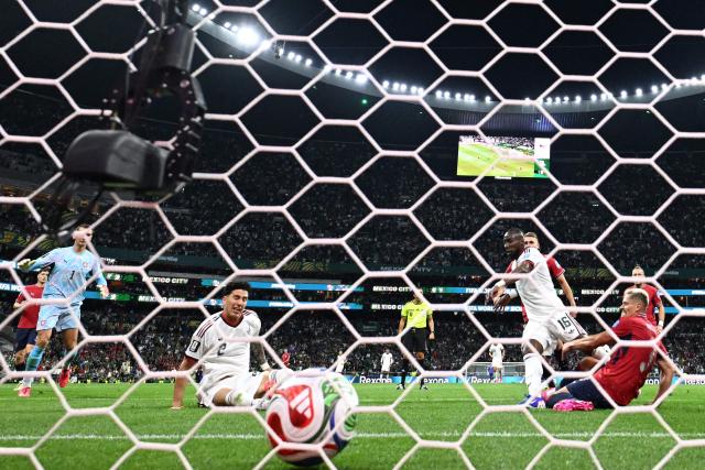 Mexico's forward #16 Julian Quinones (R) scores his team's second goal during the 2026 World Cup Group A football match between the Czech Republic and Mexico at the Mexico City Stadium in Mexico City on June 24, 2026.  (Photo by Alfredo ESTRELLA / AFP)