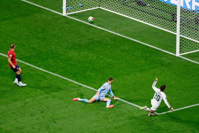 Mexico's defender #20 Mateo Chavez scores his team's first goal past Czech Republic's goalkeeper #01 Matej Kovar during the 2026 World Cup Group A football match between the Czech Republic and Mexico at the Mexico City Stadium in Mexico City on June 24, 2026.  (Photo by Rodrigo Oropeza / AFP)