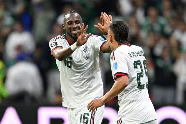 Mexico's forward #16 Julian Quinones celebrates scoring his team's second goal with teammate midfielder #25 Roberto Alvarado during the 2026 World Cup Group A football match between the Czech Republic and Mexico at the Mexico City Stadium in Mexico City on June 24, 2026.  (Photo by CARL DE SOUZA / AFP)