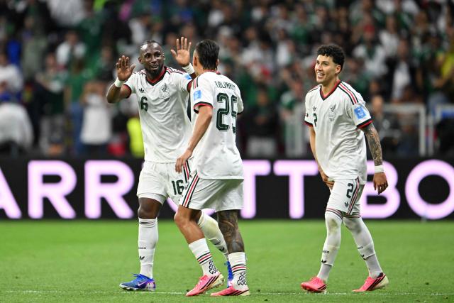 Mexico's forward #16 Julian Quinones celebrates scoring his team's second goal with teammate midfielder #25 Roberto Alvarado during the 2026 World Cup Group A football match between the Czech Republic and Mexico at the Mexico City Stadium in Mexico City on June 24, 2026.  (Photo by CARL DE SOUZA / AFP)