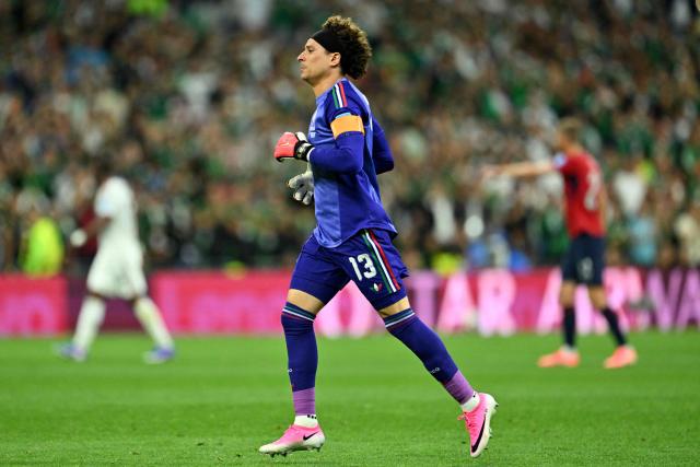 Mexico's goalkeeper #13 Guillermo Ochoa walks onto the pitch as he is substituted in during the 2026 World Cup Group A football match between the Czech Republic and Mexico at the Mexico City Stadium in Mexico City on June 24, 2026.  (Photo by CARL DE SOUZA / AFP)