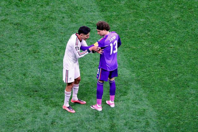 Mexico's midfielder #04 Edson Alvarez (L) adjusts the captain armband on goalkeeper #13 Guillermo Ochoa during the 2026 World Cup Group A football match between the Czech Republic and Mexico at the Mexico City Stadium in Mexico City on June 24, 2026.  (Photo by Rodrigo Oropeza / AFP)