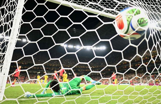 South Korea's goalkeeper #01 Kim Seung-gyu fails to save a goal scored by South Africa's forward #12 Thapelo Maseko (off frame) during the 2026 World Cup Group A football match between South Africa and South Korea at the Monterrey Stadium in Guadalupe, Mexico, on June 24, 2026.  (Photo by YURI CORTEZ / AFP)