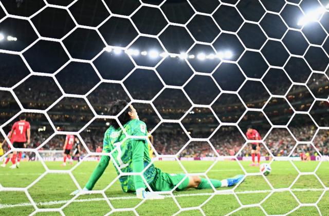 South Korea's goalkeeper #01 Kim Seung-gyu reacts after failing to save a goal scored by South Africa's forward #12 Thapelo Maseko (off frame) during the 2026 World Cup Group A football match between South Africa and South Korea at the Monterrey Stadium in Guadalupe, Mexico, on June 24, 2026.  (Photo by YURI CORTEZ / AFP)
