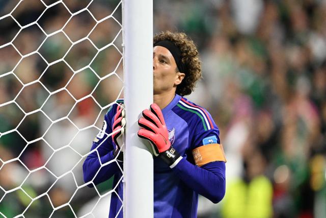 Mexico's goalkeeper #13 Guillermo Ochoa kisses the goalpost after winning the 2026 World Cup Group A football match between the Czech Republic and Mexico at the Mexico City Stadium in Mexico City on June 24, 2026.  (Photo by CARL DE SOUZA / AFP)