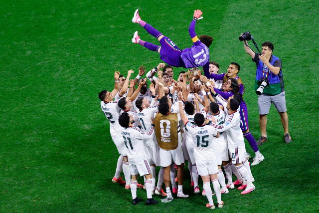 Mexico's players lift up goalkeeper #13 Guillermo Ochoa after winning the 2026 World Cup Group A football match between the Czech Republic and Mexico at the Mexico City Stadium in Mexico City on June 24, 2026.  (Photo by Rodrigo Oropeza / AFP)
