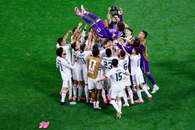Mexico's players lift up goalkeeper #13 Guillermo Ochoa after winning the 2026 World Cup Group A football match between the Czech Republic and Mexico at the Mexico City Stadium in Mexico City on June 24, 2026.  (Photo by Rodrigo Oropeza / AFP)