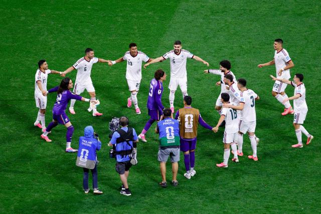Mexico's players gather around goalkeeper #13 Guillermo Ochoa after winning the 2026 World Cup Group A football match between the Czech Republic and Mexico at the Mexico City Stadium in Mexico City on June 24, 2026.  (Photo by Rodrigo Oropeza / AFP)