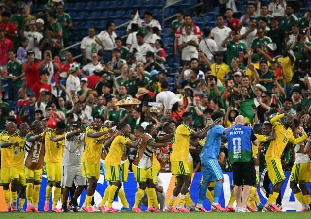 South African players celebrate the 1-0 victory in the 2026 World Cup Group A football match between South Africa and South Korea at the Monterrey Stadium in Guadalupe, Mexico, on June 24, 2026.  (Photo by Yuri CORTEZ / AFP)