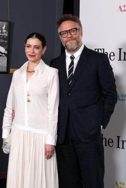 Canadian actor Seth Rogen (R) and wife Lauren Miller Rogen attend the Los Angeles premiere of "The Invite" at the Directors Guild of America Theater in Los Angeles on June 23, 2026. (Photo by VALERIE MACON / AFP)