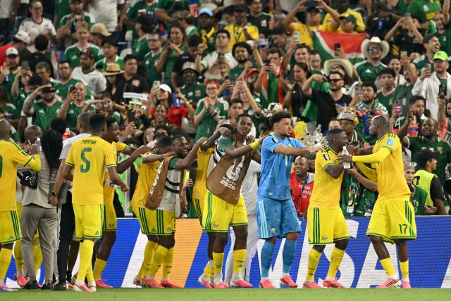 South African players celebrate the 1-0 victory in the 2026 World Cup Group A football match between South Africa and South Korea at the Monterrey Stadium in Guadalupe, Mexico, on June 24, 2026.  (Photo by Yuri CORTEZ / AFP)