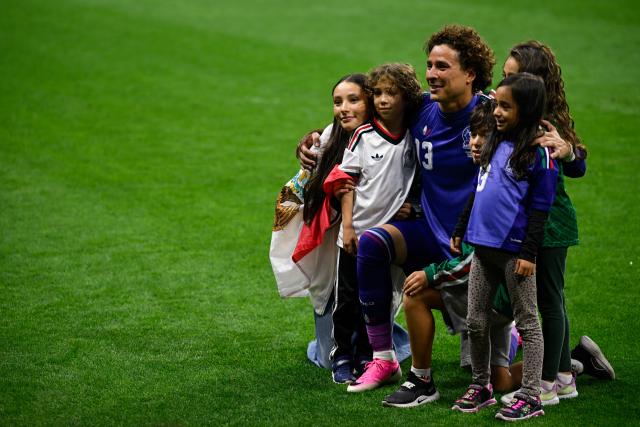Mexico's goalkeeper #13 Guillermo Ochoa and relatives pose for a photo after winning the 2026 World Cup Group A football match between the Czech Republic and Mexico at the Mexico City Stadium in Mexico City on June 24, 2026.  (Photo by Alfredo ESTRELLA / AFP)