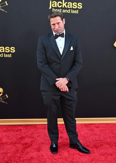US surfer and stunt performer Sean McInerney aka Poopies attends the Los Angeles premiere of "Jackass: Best and Last" at the Paramount Theatre in Los Angeles on June 23, 2026. (Photo by LISA O'CONNOR / AFP)