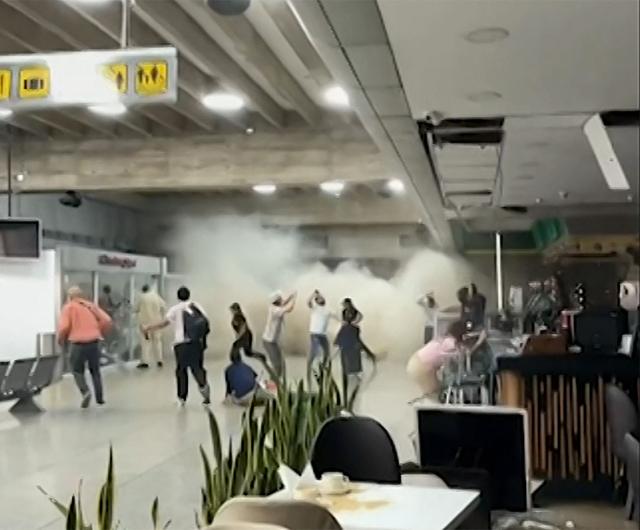An image grabs obtained on June 25, 2026 from UGC images published on the official Instagram account of Venezuelan Deputy for the State of Barinas Wilmer Azuaje allegedly shows parts of the Simon Bolivar airport collapsing on June 25, 2026. Two earthquakes of magnitude 7.2 and 7.5 have struck the same area of Venezuela, causing buildings to collapse, according to the United States Geological Survey (USGS) and AFP journalists. (Photo by @azuaje_wilmer/Instagram / AFP)