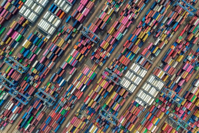 This aerial photo shows containers at a port in Qingdao, China’s eastern Shandong province on June 25, 2026. (Photo by CN-STR / AFP) / China OUT