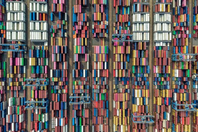 This aerial photo shows containers at a port in Qingdao, China’s eastern Shandong province on June 25, 2026. (Photo by CN-STR / AFP) / China OUT