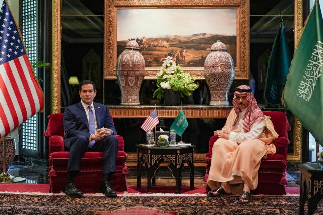 US Secretary of State Marco Rubio (L) meets Saudi Foreign Minister Faisal bin Farhan al-Saud during his visit to the Middle East to discuss the interim deal between the US and Iran with Arab Gulf allies, in Manama on June 25, 2026. Top US diplomat Marco Rubio was in Bahrain on June 25, after promising Gulf allies that Washington would protect their interests as it seeks to hammer out a final settlement to end the war with Iran. Rubio is on a regional tour to reassure the Gulf states, which were targeted by Tehran's missiles and drones during the conflict and saw their crucial oil and gas shipments effectively cut off by an Iranian blockade of the Strait of Hormuz. (Photo by Eric Lee / POOL / AFP)