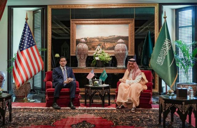 US Secretary of State Marco Rubio (L) meets Saudi Foreign Minister Faisal bin Farhan al-Saud during his visit to the Middle East to discuss the interim deal between the US and Iran with Arab Gulf allies, in Manama on June 25, 2026. Top US diplomat Marco Rubio was in Bahrain on June 25, after promising Gulf allies that Washington would protect their interests as it seeks to hammer out a final settlement to end the war with Iran. Rubio is on a regional tour to reassure the Gulf states, which were targeted by Tehran's missiles and drones during the conflict and saw their crucial oil and gas shipments effectively cut off by an Iranian blockade of the Strait of Hormuz. (Photo by Eric Lee / POOL / AFP)