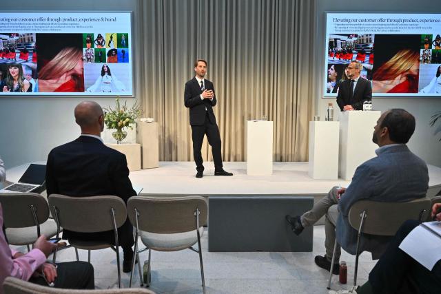 H&M Group CEO Daniel Ervér (C) speaks during a press conference to present the six-month report of fashion group Hennes & Mauritz on June 25, 2026 2026 in Stockholm, Sweden. Swedish fast-fashion giant H&M reported a drop in sales for its second financial quarter, with operating profit holding steady but below the level analysts were expecting. (Photo by Claudio BRESCIANI / TT News Agency / AFP) / Sweden OUT
