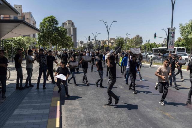 Members of the Bedouin community rally as they protest against the increasing house demolishing policy by the Israeli government in southern Israeli city of Beer Sheva on June 25, 2026. (Photo by ilia YEFIMOVICH / AFP)