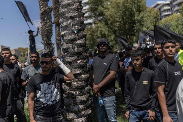 Members of the Bedouin community rally as they protest against the increasing house demolishing policy by the Israeli government in southern Israeli city of Beer Sheva on June 25, 2026. (Photo by ilia YEFIMOVICH / AFP)