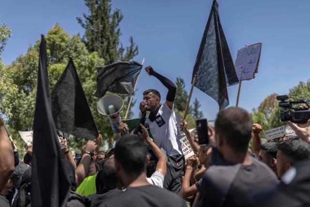 A member of the Bedouin community leads the rally during a protest against the increasing house demolishing policy by the Israeli government in southern Israeli city of Beer Sheva on June 25, 2026. (Photo by ilia YEFIMOVICH / AFP)