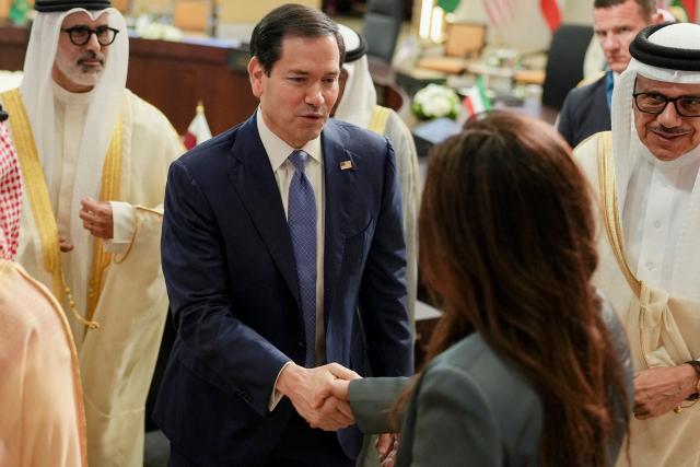US Secretary of State Marco Rubio shakes hands with Minister of State at the Ministry of Foreign Affairs of the United Arab Emirates Lana Nusseibeh after a meeting with foreign ministers of the Gulf Cooperation Council Member States
in Manama on June 25, 2026.. Top US diplomat Marco Rubio was in Bahrain on June 25, after promising Gulf allies that Washington would protect their interests as it seeks to hammer out a final settlement to end the war with Iran. Rubio is on a regional tour to reassure the Gulf states, which were targeted by Tehran's missiles and drones during the conflict and saw their crucial oil and gas shipments effectively cut off by an Iranian blockade of the Strait of Hormuz. (Photo by Eric Lee / POOL / AFP)