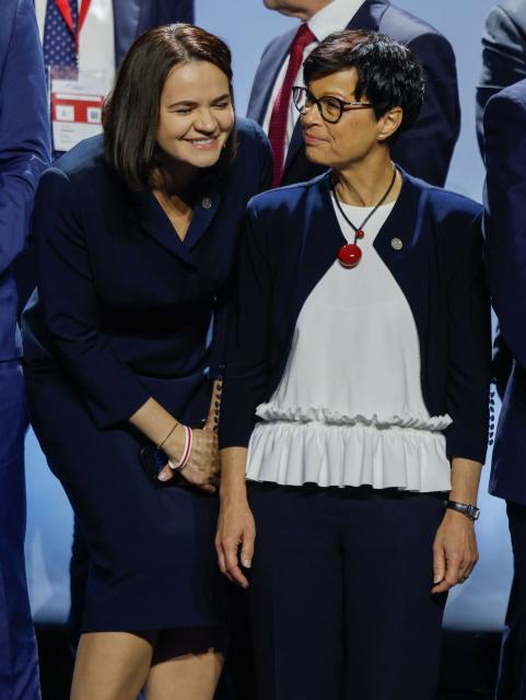 Belarusian opposition leader Svetlana Tsikhanovskaya and the EU Commissioner for Enlargement Marta Kos talk as they pose for a family photo of the Ukraine Recovery Conference (URC 2026) in Gdansk, Poland, on June 25, 2026. The Ukraine Recovery Conference (URC 2026), co-hosted by Poland and Ukraine, takes place in Gdansk on June 25–26, 2026, aiming to strengthen support for Ukraine’s reconstruction and boost investment, with a focus on energy, critical infrastructure, and logistics sectors. (Photo by Wojtek RADWANSKI / AFP)