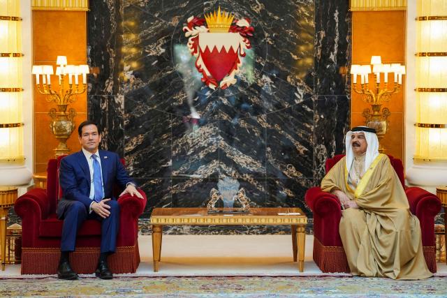 US Secretary of State Marco Rubio (L) meets with Bahrain's King Hamad bin Isa al-Khalifa during his visit to the Middle East to discuss the interim deal between the US and Iran with Arab Gulf allies, and to attend a meeting by the Gulf Cooperation Council Member States (GCC), at Al-Sakhir Palace, near Zallaq on June 25, 2026. Top US diplomat Marco Rubio was in Bahrain on June 25, after promising Gulf allies that Washington would protect their interests as it seeks to hammer out a final settlement to end the war with Iran. Rubio is on a regional tour to reassure the Gulf states, which were targeted by Tehran's missiles and drones during the conflict and saw their crucial oil and gas shipments effectively cut off by an Iranian blockade of the Strait of Hormuz. (Photo by Eric Lee / POOL / AFP)