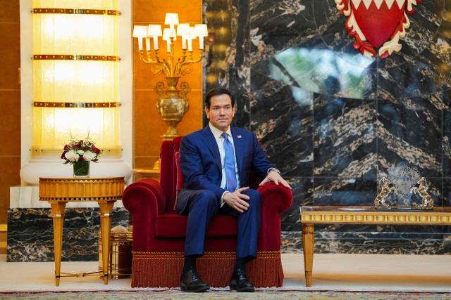 US Secretary of State Marco Rubio meets with Bahrain's King during his visit to the Middle East to discuss the interim deal between the US and Iran with Arab Gulf allies, and to attend a meeting by the Gulf Cooperation Council Member States (GCC), at Al-Sakhir Palace, near Zallaq on June 25, 2026. Top US diplomat Marco Rubio was in Bahrain on June 25, after promising Gulf allies that Washington would protect their interests as it seeks to hammer out a final settlement to end the war with Iran. Rubio is on a regional tour to reassure the Gulf states, which were targeted by Tehran's missiles and drones during the conflict and saw their crucial oil and gas shipments effectively cut off by an Iranian blockade of the Strait of Hormuz. (Photo by Eric Lee / POOL / AFP)