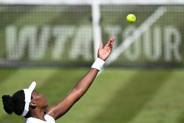 USA's Venus Williams serves the ball as she plays with Philippines' Alexandra Eala against Britain's Olivia Nicholls and Russia's Tereza Mihalikova during the women's doubles quarter-final match of the WTA 500 Bad Homburg Open tennis tournament in Bad Homburg, western Germany on June 25, 2026. (Photo by Kirill KUDRYAVTSEV / AFP)