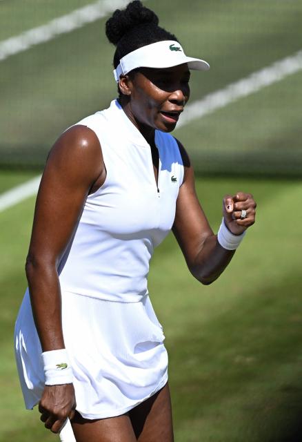 USA's Venus Williams celebrates a point as she plays with Philippines' Alexandra Eala against Britain's Olivia Nicholls and Russia's Tereza Mihalikova during the women's doubles quarter-final match of the WTA 500 Bad Homburg Open tennis tournament in Bad Homburg, western Germany on June 25, 2026. (Photo by Kirill KUDRYAVTSEV / AFP)