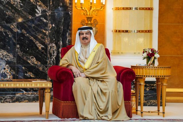 Bahrain's King Hamad bin Isa al-Khalifa meets with the US Secretary of State during his visit to the Middle East to discuss the interim deal between the US and Iran with Arab Gulf allies, and to attend a meeting by the Gulf Cooperation Council Member States (GCC), at Al-Sakhir Palace, near Zallaq on June 25, 2026. Top US diplomat Marco Rubio was in Bahrain on June 25, after promising Gulf allies that Washington would protect their interests as it seeks to hammer out a final settlement to end the war with Iran. Rubio is on a regional tour to reassure the Gulf states, which were targeted by Tehran's missiles and drones during the conflict and saw their crucial oil and gas shipments effectively cut off by an Iranian blockade of the Strait of Hormuz. (Photo by Eric Lee / POOL / AFP)